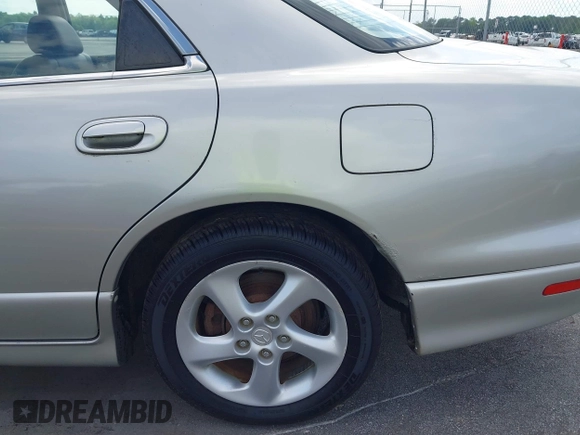 2002 Mazda Millenia with VIN JM1TA221721722364, listed as a IAAI auction lot 42160683 with 166,778 mi miles and . Bid and sale history available at DreamBid. Image 15.