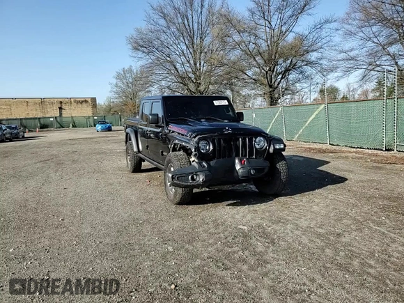 2020 Jeep Gladiator Rubicon z VIN 1C6JJTBG9LL184085, wystawiony jako Copart lot #51382115 z przebiegiem 83 375 mil mil oraz Szkoda całkowita • Salvage title. Historia ofert i sprzedaży dostępna na DreamBid. Obrazek 12.
