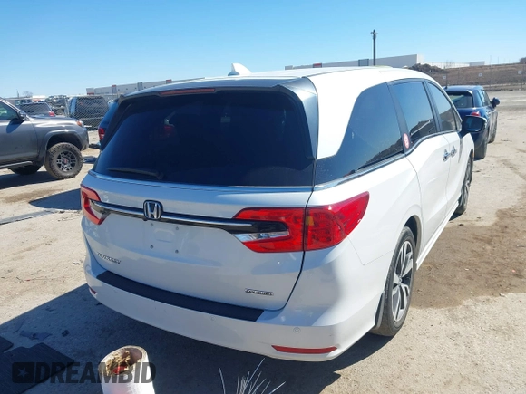 2023 Honda Odyssey Touring with VIN 5FNRL6H88PB003865, listed as a IAAI auction lot 41715384 with 40,765 mi miles and . Bid and sale history available at DreamBid. Image 4.