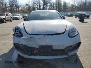 2023 Porsche Panamera z VIN WP0AJ2A79PL101328, wystawiony jako Copart lot #55093015 z przebiegiem 26 927 mil mil oraz Szkody całkowita. Historia ofert i sprzedaży dostępna na DreamBid. Obrazek 5.