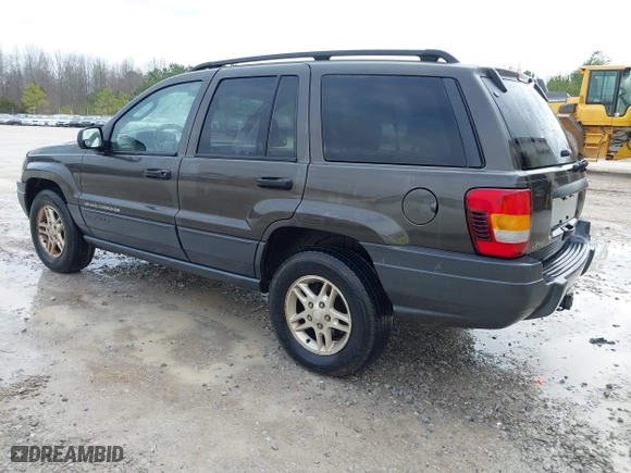 2004 Jeep Grand Cherokee Laredo with VIN 1J4GX48N74C412982, listed as a IAAI auction lot 41496258 with 195,671 mi miles. Bid and sale history available at carsss.com. Image 3.