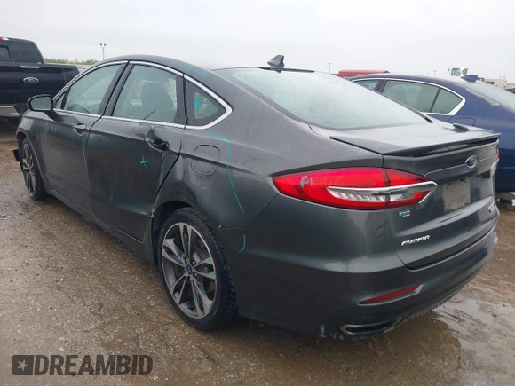 2020 Ford Fusion Titanium with VIN 3FA6P0K97LR192657, listed as a IAAI auction lot 42170258 with 87,696 mi miles and . Bid and sale history available at DreamBid. Image 3.
