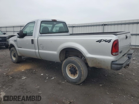2002 Ford F-350 XL with VIN 1FTSF31F12EB21069, listed as a Copart auction lot 84287374 with 110,890 mi miles and Salvage Title. Bid and sale history available at DreamBid. Image 2.