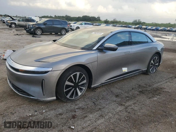 2023 Lucid Air Touring z VIN 50EA1TEA5PA004467, wystawiony jako Copart lot #76620154 z przebiegiem 6 108 mil mil oraz Szkoda całkowita • Salvage title. Historia ofert i sprzedaży dostępna na DreamBid. Obrazek 1.