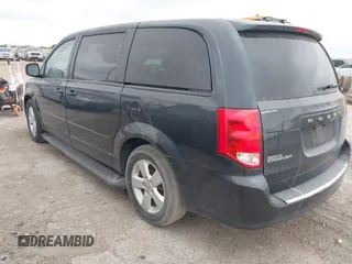 2013 Dodge Grand Caravan SE with VIN 2C4RDGBG0DR641272, listed as a IAAI auction lot 42046978 with 159,342 mi miles and . Bid and sale history available at DreamBid. Image 3.