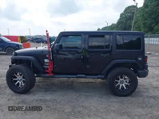 2012 Jeep Wrangler Unlimited Sahara with VIN 1C4HJWEG0CL168300, listed as a IAAI auction lot 42430678 with 70,000 mi miles and . Bid and sale history available at DreamBid. Image 15.