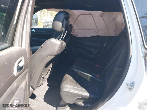 2015 Jeep Grand Cherokee Altitude with VIN 1C4RJFAG4FC924869, listed as a IAAI auction lot 41656444 with 112,786 mi miles. Bid and sale history available at carsss.com. Image 8.