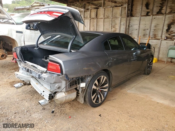 2012 Dodge Charger SRT8 with VIN 2C3CDXEJ1CH240058, listed as a Copart auction lot 73943004 with 72,013 mi miles and Salvage Title. Bid and sale history available at carsss.com. Image 3.