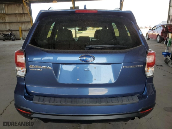 2018 Subaru Forester Premium with VIN JF2SJADCXJH504754, listed as a Copart auction lot 52184115 with 77,582 mi miles and Salvage Title. Bid and sale history available at carsss.com. Image 6.
