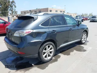 2010 Lexus RX 350 with VIN 2T2BK1BA8AC061209, listed as a IAAI auction lot 42105424 with 242,961 mi miles. Bid and sale history available at carsss.com. Image 4.