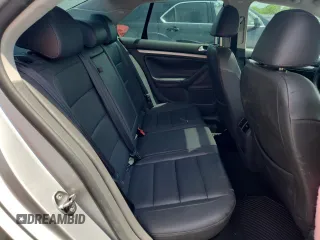 2007 Volkswagen Jetta Wolfsburg Edition z VIN 3VWEF71K57M189021, wystawiony jako Copart lot #59019685 z przebiegiem 124 720 mil mil oraz Szkoda całkowita • Salvage title. Historia ofert i sprzedaży dostępna na DreamBid. Obrazek 11.