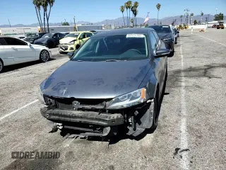 2014 Volkswagen Jetta SE with VIN 3VWD17AJ2EM322087, listed as a Copart auction lot 62571155 with 71,884 mi miles and Salvage title. Bid and sale history available at DreamBid. Image 13.
