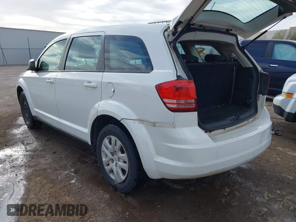 2014 Dodge Journey American Value with VIN 3C4PDCAB1ET209973, listed as a IAAI auction lot 41803864 with 168,774 mi miles and . Bid and sale history available at DreamBid. Image 3.