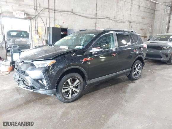 2018 Toyota RAV4 XLE with VIN 2T3RFREVXJW857874, listed as a IAAI auction lot 39456391 with 120,516 mi miles. Bid and sale history available at carsss.com. Image 18.