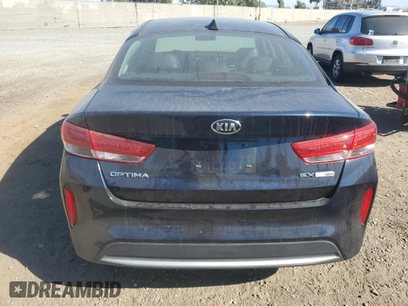 2018 Kia Optima EX z VIN KNAGU4LE4J5022036, wystawiony jako Copart lot #67970784 z przebiegiem 60 022 mil mil oraz Szkoda całkowita • Salvage title. Historia ofert i sprzedaży dostępna na DreamBid. Obrazek 6.