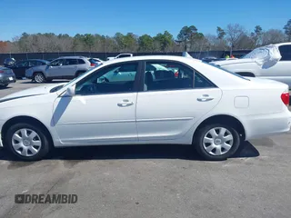 2006 Toyota Camry STD with VIN 4T1BE32KX6U734944, listed as a IAAI auction lot 41745226 with 243,967 mi miles. Bid and sale history available at carsss.com. Image 14.