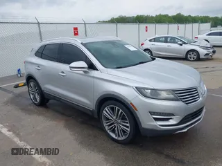 2015 Lincoln MKC z VIN 5LMTJ2AH0FUJ27125, wystawiony jako IAAI lot #42099082 z przebiegiem 110 149 mil mil oraz . Historia ofert i sprzedaży dostępna na DreamBid. Obrazek 1.
