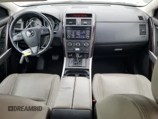2015 Mazda CX-9 Grand Touring z VIN JM3TB2DAXF0448042, wystawiony jako Copart lot #53620085 z przebiegiem 134 386 mil mil oraz Szkoda całkowita • Salvage title. Historia ofert i sprzedaży dostępna na DreamBid. Obrazek 8.