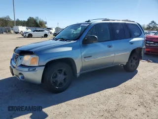 2006 GMC Envoy SLT with VIN 1GKDT13S462273424, listed as a Copart auction lot 81840184 with 210,839 mi miles and Salvage Title. Bid and sale history available at carsss.com. Image 1.