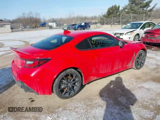 2023 Toyota GR86 Premium with VIN JF1ZNBE11P9756535, listed as a IAAI auction lot 41555556 with 7,321 mi miles. Bid and sale history available at carsss.com. Image 4.