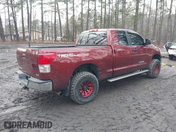 2010 Toyota Tundra 4WD Truck with VIN 5TFUM5F13AX008637, listed as a IAAI auction lot 41458700 with 212,845 mi miles. Bid and sale history available at carsss.com. Image 4.