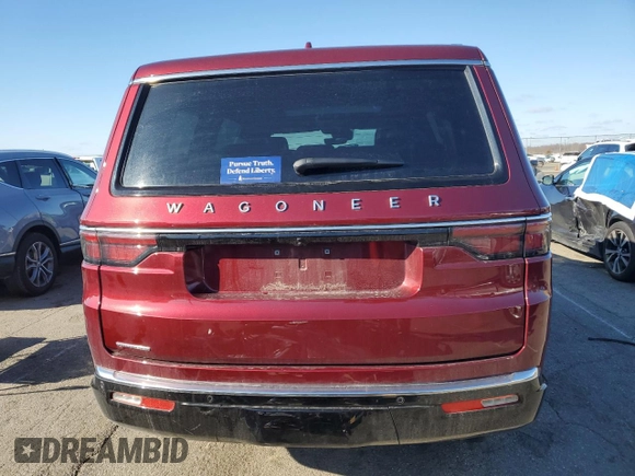 2023 Jeep Wagoneer z VIN 1C4SJVAP9PS569989, wystawiony jako Copart lot #81298154 z przebiegiem 18 133 mil mil oraz Szkoda całkowita • Salvage title. Historia ofert i sprzedaży dostępna na DreamBid. Obrazek 6.