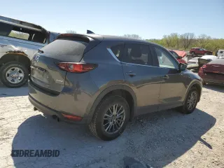 2017 Mazda CX-5 Touring with VIN JM3KFACL1H0100436, listed as a Copart auction lot 53058875 with 77,205 mi miles and Salvage Title. Bid and sale history available at DreamBid. Image 3.