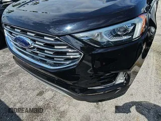 2020 Ford Edge Titanium z VIN 2FMPK3K91LBA60874, wystawiony jako IAAI lot #42470865 z przebiegiem 94 048 mil mil oraz . Historia ofert i sprzedaży dostępna na DreamBid. Obrazek 3.