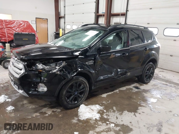 2018 Ford Escape SE with VIN 1FMCU9GD7JUD36295, listed as a IAAI auction lot 41855037 with 85,305 mi miles. Bid and sale history available at carsss.com. Image 22.