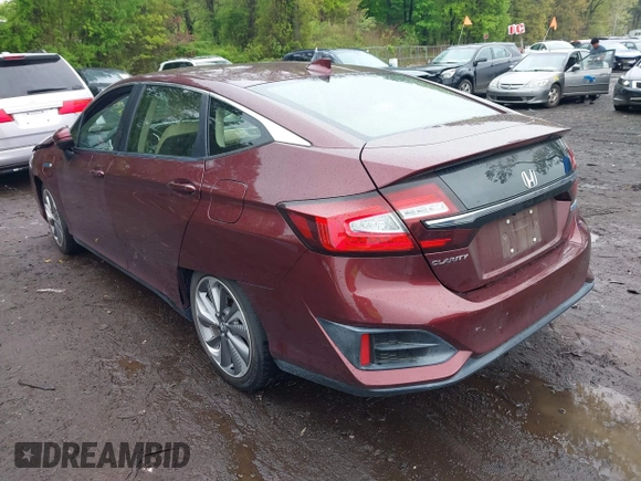2018 Honda Clarity z VIN JHMZC5F12JC021958, wystawiony jako IAAI lot #42191071 z przebiegiem 29 423 mil mil oraz . Historia ofert i sprzedaży dostępna na DreamBid. Obrazek 3.