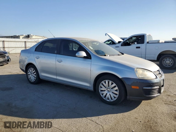 2010 Volkswagen Jetta Sedan S with VIN 3VWJZ7AJ3AM003870, listed as a Copart auction lot 88937865 with 186,273 mi miles and Salvage Title. Bid and sale history available at carsss.com. Image 4.
