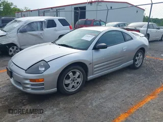 2000 Mitsubishi Eclipse GT z VIN 4A3AC84L5YE103909, wystawiony jako IAAI lot #42425327 z przebiegiem 112 940 mil mil oraz . Historia ofert i sprzedaży dostępna na DreamBid. Obrazek 2.