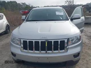 2012 Jeep Grand Cherokee Laredo with VIN 1C4RJFAG7CC189381, listed as a IAAI auction lot 41429085 with 137,238 mi miles. Bid and sale history available at carsss.com. Image 6.