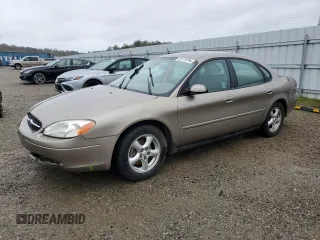 2003 Ford Taurus SE Standard with VIN 1FAFP53U03A252904, listed as a Copart auction lot 82175794 with 156,490 mi miles and Salvage Title. Bid and sale history available at carsss.com. Image 1.