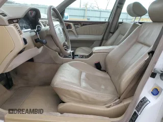 1998 Mercedes-Benz E-Class with VIN WDBJF65F4WA665505, listed as a Copart auction lot 42311695 with 389,016 mi miles and Salvage Title. Bid and sale history available at carsss.com. Image 7.