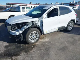 2022 Ford Escape SE Hybrid with VIN 1FMCU9BZ5NUA46050, listed as a IAAI auction lot 41693532 with 34,676 mi miles and . Bid and sale history available at carsss.com. Image 18.
