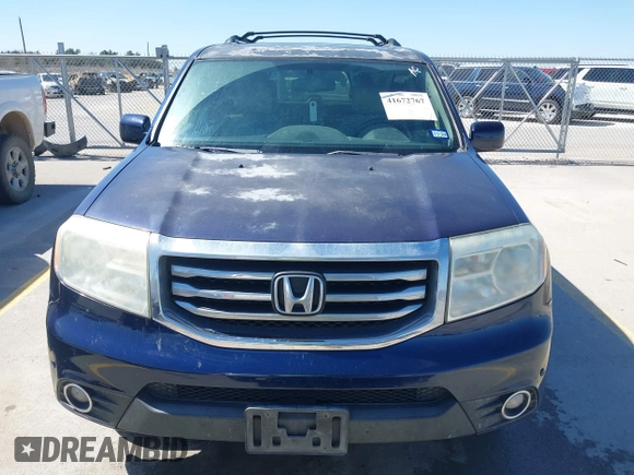 2013 Honda Pilot Touring with VIN 5FNYF3H94DB018384, listed as a IAAI auction lot 41672767 with 188,922 mi miles and . Bid and sale history available at DreamBid. Image 12.