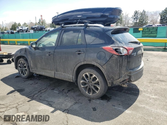 2016 Mazda CX-5 Grand Touring with VIN JM3KE4DYXG0730145, listed as a Copart auction lot 51666535 with 117,677 mi miles and Salvage Title. Bid and sale history available at carsss.com. Image 2.