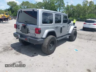 2021 Jeep Wrangler Unlimited Sahara with VIN 1C4HJXEN9MW637288, listed as a IAAI auction lot 42553459 with 39,362 mi miles and . Bid and sale history available at DreamBid. Image 4.
