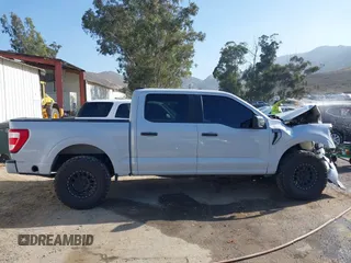 2021 Ford F-150 XL with VIN 1FTEW1CP5MKD48227, listed as a IAAI auction lot 42272809 with 87,614 mi miles and . Bid and sale history available at DreamBid. Image 13.