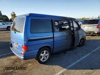 2001 Volkswagen EuroVan MV с VIN WV2NB47061H099148, выставлен на аукционе Copart как лот 77123813 с пробегом Не указан миль и На запчасти • Non repairable. История ставок и продаж доступна на DreamBid. Изображение 3.