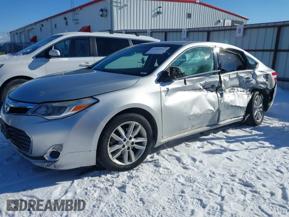 2013 Toyota Avalon XLE with VIN 4T1BK1EBXDU009947, listed as a IAAI auction lot 41562857 with 174,764 mi miles and . Bid and sale history available at DreamBid. Image 2.