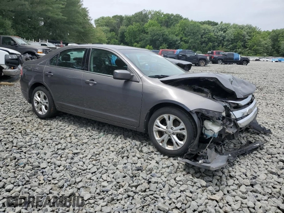 2012 Ford Fusion SE with VIN 3FAHP0HA0CR355529, listed as a Copart auction lot 62585515 with 113,094 mi miles and Salvage title. Bid and sale history available at DreamBid. Image 4.