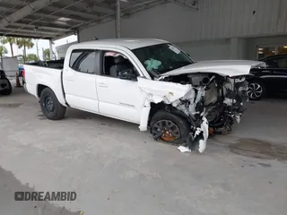 2023 Toyota Tacoma SR5 with VIN 3TMAZ5CN6PM206591, listed as a IAAI auction lot 42350675 with 30,714 mi miles and . Bid and sale history available at DreamBid. Image 1.