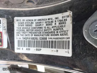 2006 Honda Civic Sdn EX with VIN 1HGFA16826L133698, listed as a IAAI auction lot 41870828 with 202,030 mi miles. Bid and sale history available at carsss.com. Image 9.