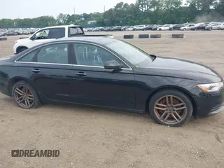 2015 Audi A6 Premium Plus z VIN WAUGFAFCXFN010306, wystawiony jako IAAI lot #42505993 z przebiegiem Nie podano mil oraz . Historia ofert i sprzedaży dostępna na DreamBid. Obrazek 12.