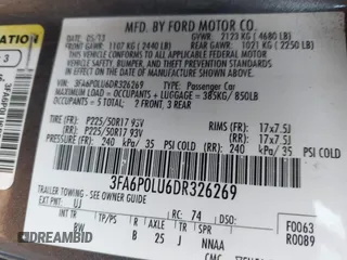 2013 Ford Fusion SE Hybrid with VIN 3FA6P0LU6DR326269, listed as a IAAI auction lot 41999417 with 277,891 mi miles. Bid and sale history available at carsss.com. Image 9.