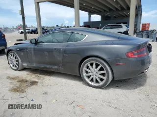 2005 Aston Martin DB9 z VIN SCFAD01A95GA00873, wystawiony jako Copart lot #63428354 z przebiegiem Nie podano mil oraz Szkody całkowita. Historia ofert i sprzedaży dostępna na DreamBid. Obrazek 2.