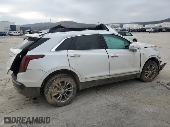 2021 Cadillac XT5 FWD Premium Luxury z VIN 1GYKNCR41MZ154357, wystawiony jako Copart lot #86819564 z przebiegiem Nie podano mil oraz Nie do naprawy • Non repairable. Historia ofert i sprzedaży dostępna na DreamBid. Obrazek 3.