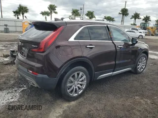 2021 Cadillac XT4 FWD Premium Luxury z VIN 1GYFZCR45MF080027, wystawiony jako Copart lot #46195835 z przebiegiem Nie podano mil oraz Nie do naprawy • Non repairable. Historia ofert i sprzedaży dostępna na DreamBid. Obrazek 3.